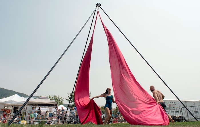 (Rick Egan  |  The Salt Lake Tribune)    Christian Butters, and Christy Livingston perform with Cirque Orenda aerial acrobatics at the Davis County Fair in Farmington, Saturday, Aug. 18, 2018.