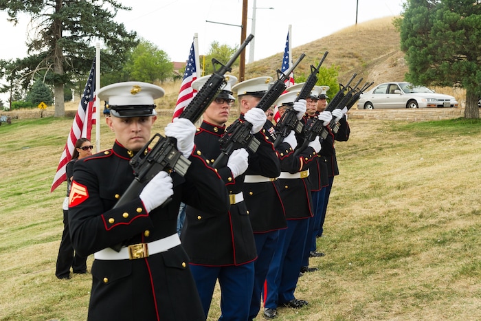 (Alex Gallivan  |  Special to The Tribune) Marine Pfc. Robert K. Holmes, who died 77 years ago aboard the USS Oklahoma during the attack on Pearl Harbor, is laid to rest in the Salt Lake City Cemetery, Monday, Aug. 20, 2018.