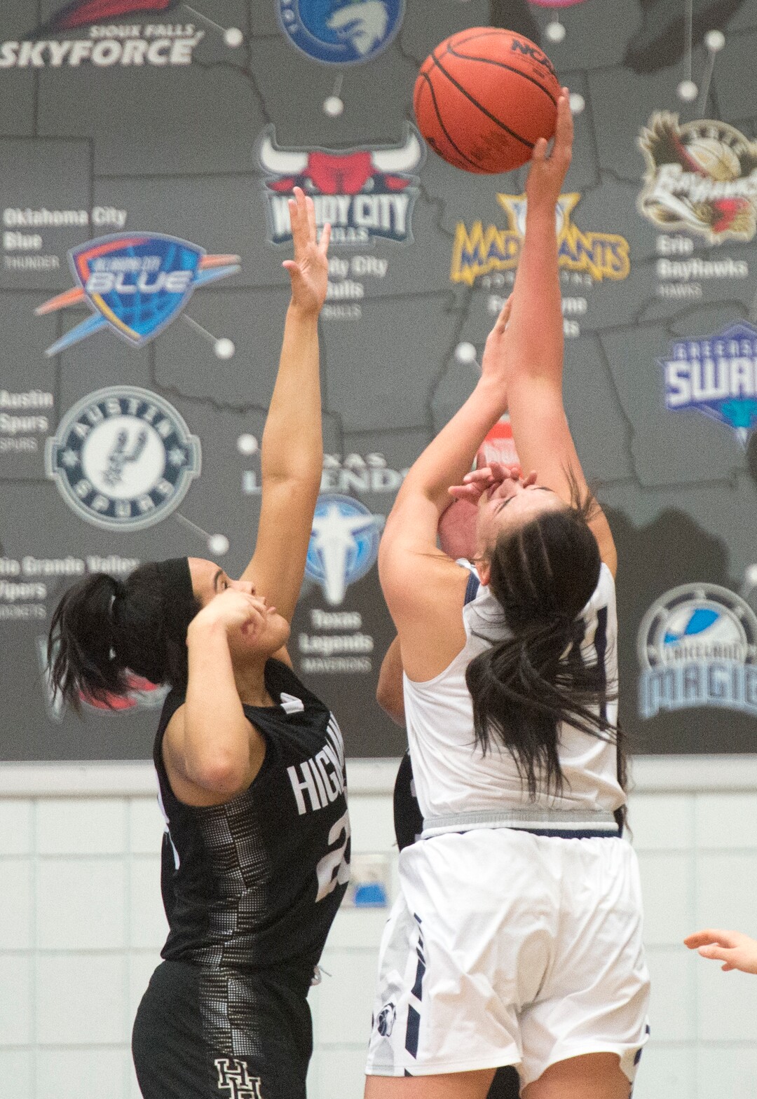 (Rick Egan  |  The Salt Lake Tribune)    Corner Canyon Chargers Angela Vaifanua shoots as Highand High Rams Kaija Glasker (22)  defends, in Class 5A women's basketball playoff game between Corner Canyon and Highland, Monday, Feb. 19, 2018.