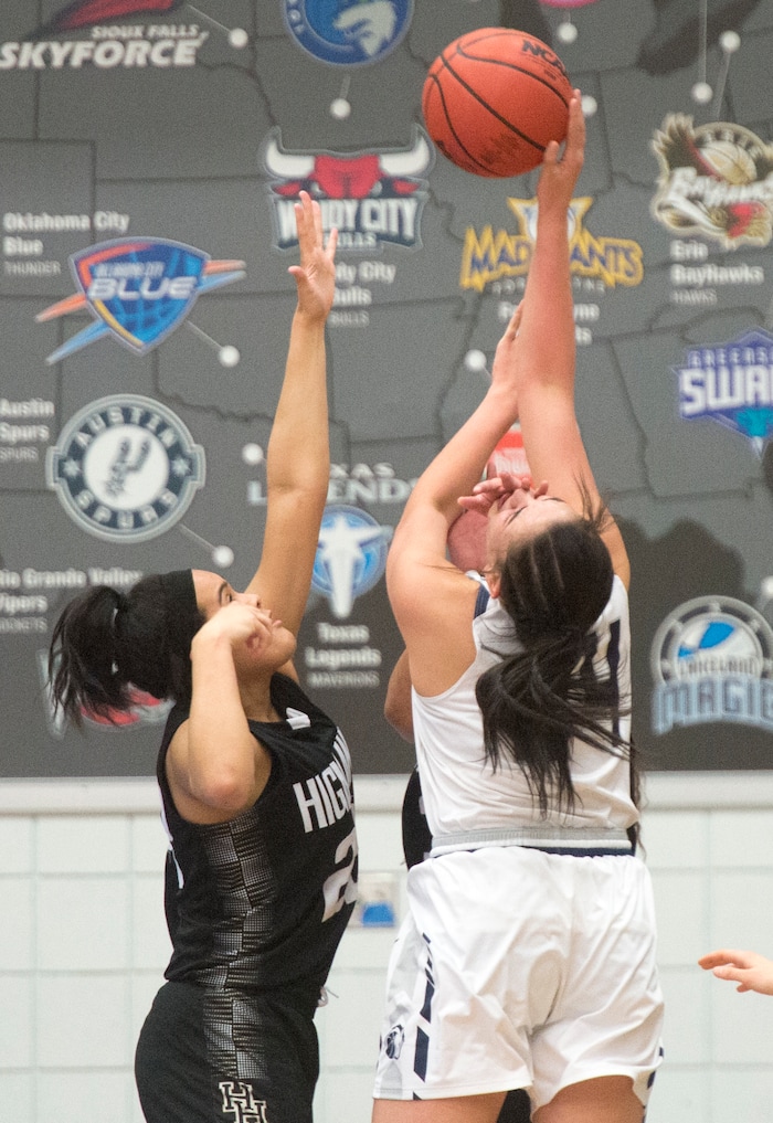 (Rick Egan | The Salt Lake Tribune) Corner Canyon Chargers Angela Vaifanua shoots as Highand High Rams Kaija Glasker (22) defends, in Class 5A women's basketball playoff game between Corner Canyon and Highland, Monday, Feb. 19, 2018.
