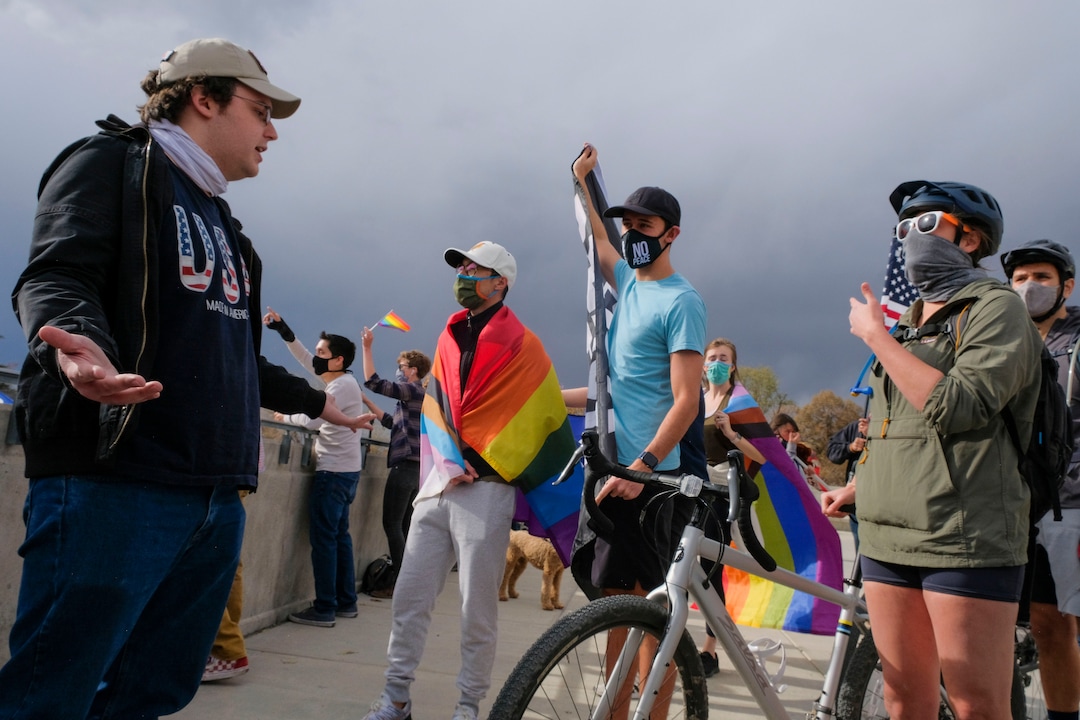 (Leah Hogsten  |  The Salt Lake Tribune) Charlie Kaing, Brogan Johnson and Viveca Falks got into a back and forth with a Trump supporter, left.  As news broke of former Vice President Joe Biden earning enough Electoral College votes to secure the presidency Saturday, Trump protesters took to the Capitol to denounce the win.