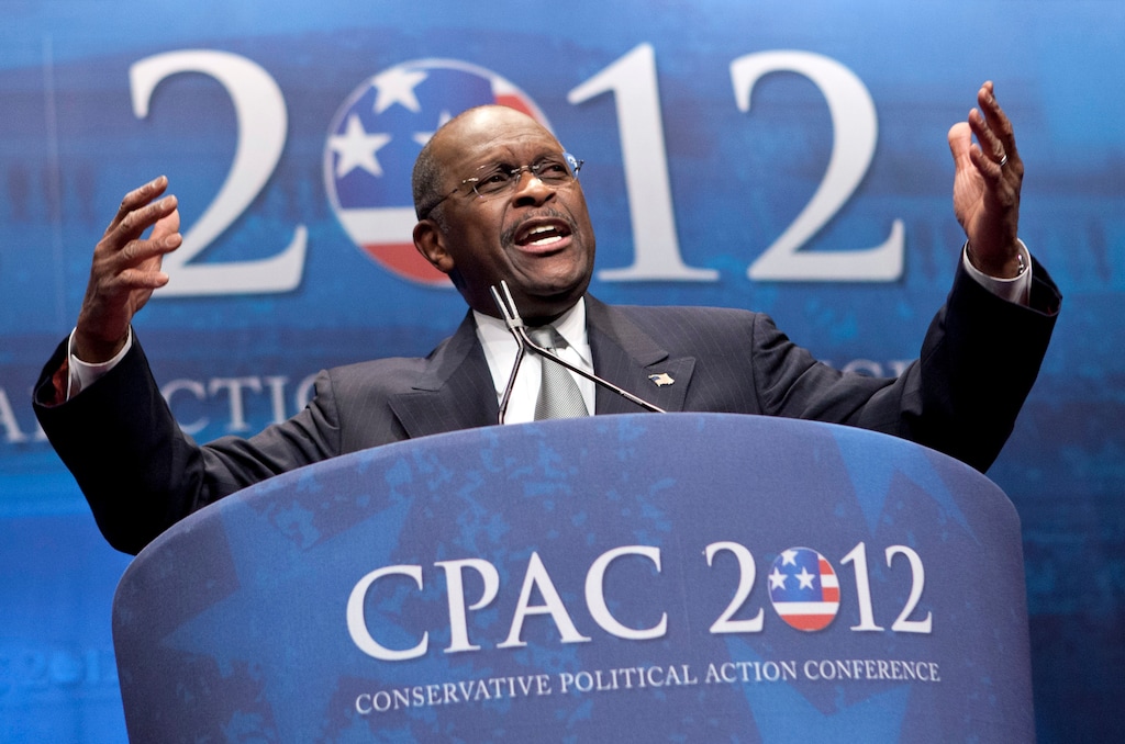 (J. Scott Applewhite | AP file photo) In this Feb. 9, 2012 file photo, former presidential candidate Herman Cain addresses the Conservative Political Action Conference in Washington.  Cain has died after battling the coronavirus. A post on Cain's Twitter account on Thursday, July 30, 2020 announced the death.