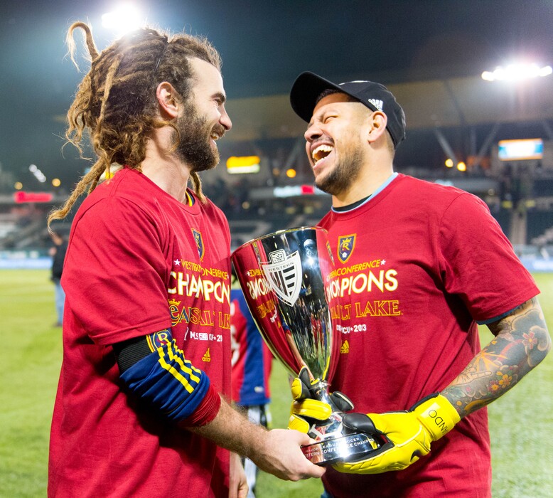 Trent Nelson  |  The Salt Lake TribuneReal Salt Lake's Kyle Beckerman (5) and Nick Rimando (18) hold the Western Conference trophy after defeating the Portland Timbers, MLS soccer Sunday November 24, 2013 in Portland.