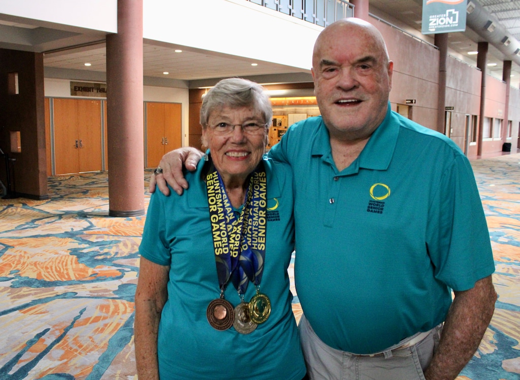(Lexy Borgogno | The Southern Utah Tribune) Sherril and Stan Rasmussen pose at the Dixie Convention Center where they will check in up to 12,000 athletes for the Huntsman World Senior Games. They compete and volunteer at the Games.