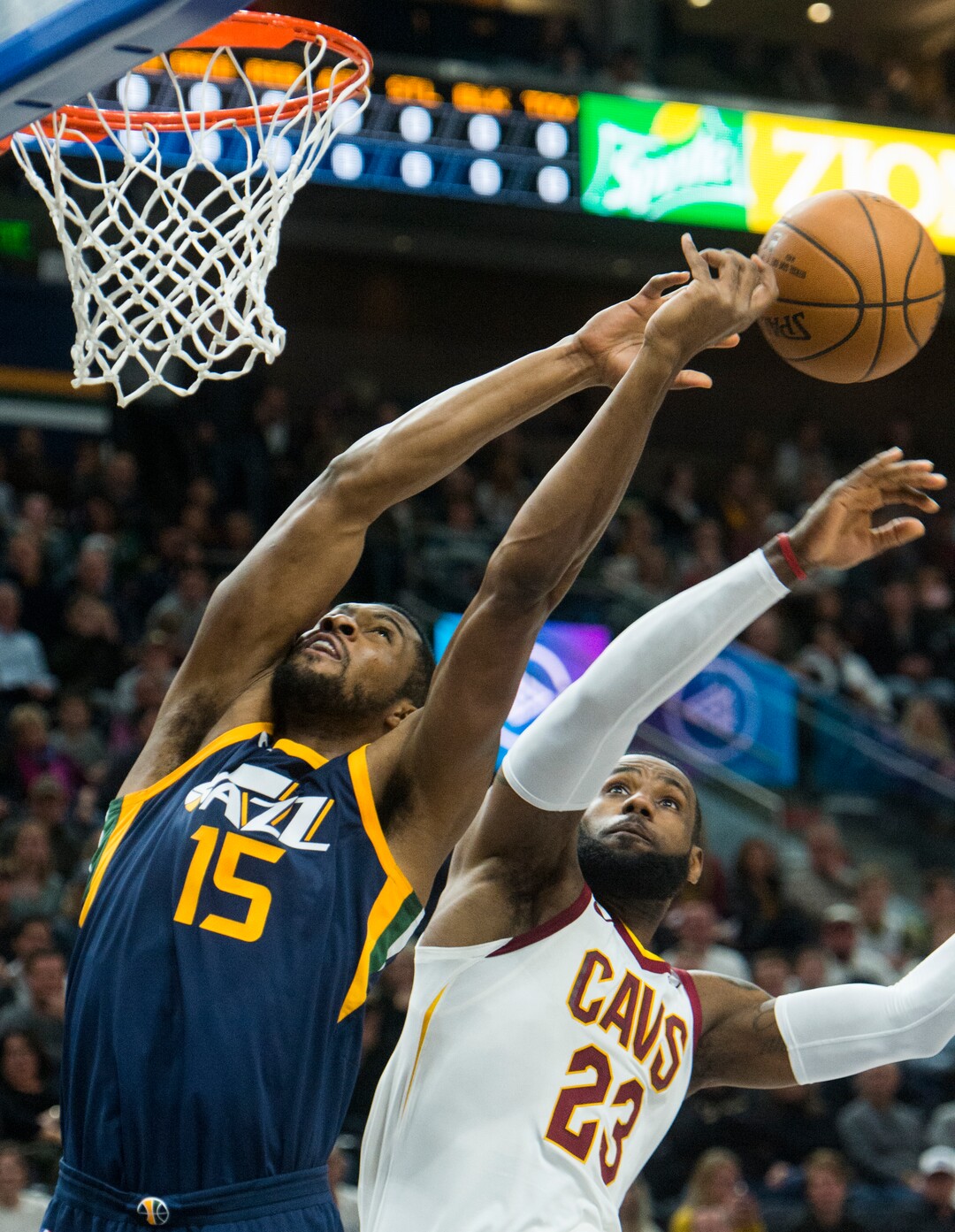 (Rick Egan  |  The Salt Lake Tribune)   Utah Jazz forward Derrick Favors (15) goes for a rebound along with Cleveland Cavaliers forward LeBron James (23), in NBA action Utah Jazz vs Cleveland Cavaliers, in Salt Lake City,  Saturday, December 30, 2017.