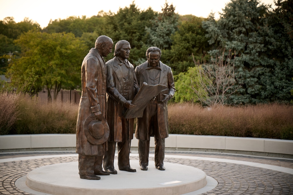 (The Church of Jesus Christ of Latter-day Saints) A statue of Brigham Young and his counselors, Heber C. Kimball and Willard Richards, at the Kanesville Memorial Historic Site in Council Bluffs, Iowa, on Sept. 28, 2024. Young and his counselors reorganized the First Presidency here in 1847.