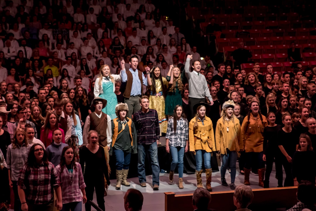 (Courtesy of the LDS Church) More than 3,000 Latter-day Saint youth performed a history and culture of the settling of Cedar City, Utah, during a cultural celebration December 9, 2017. “A Light on a Hill, Iron in Our Will,” was the theme of the program and preceded the dedication of the Cedar City Utah Temple.