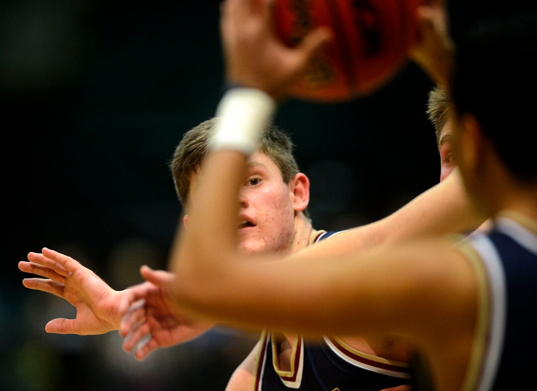 (Steve Griffin  |  The Salt Lake Tribune) Herriman's Blake Freeland looks for a pass during 6A basketball playoff game against Lone Peak at the Utah Valley UniversityÕs UCCU Center in Provo Tuesday Feb. 27, 2018.