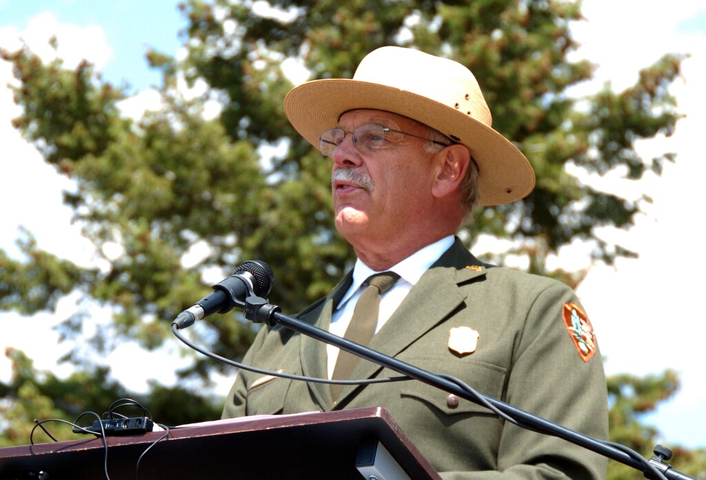 (Matthew Brown | Associated Press file photo) This August 17, 2017, file photo shows Yellowstone Superintendent Dan Wenk speaking at an event marking a conservation agreement for a former mining site just north of the park in Jardine, Mont. Wenk announced last week that he intended to retire March 30, 2019, after being offered a transfer he didn't want. He said he was informed this week by National Park Service Acting Director Paul "Dan" Smith that a new superintendent will be in place in August and that Wenk will be gone by then.