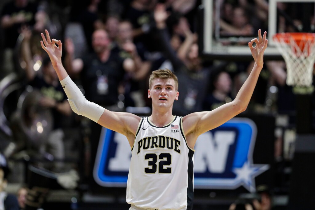 Purdue center Matt Haarms (32) celebrates during the second half of the team's NCAA college basketball game against Iowa in West Lafayette, Ind., Wednesday, Feb. 5, 2020. Purdue defeated Iowa 104-68. (AP Photo/Michael Conroy)