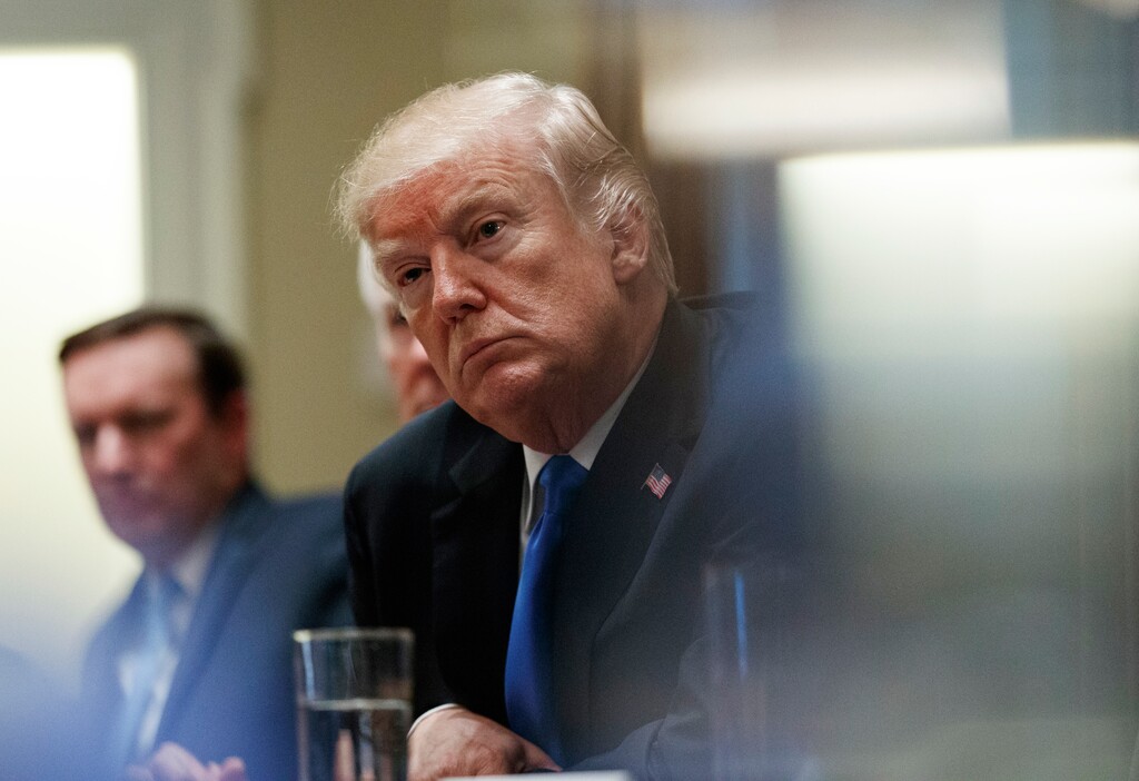 President Donald Trump pauses during a meeting in the Cabinet Room of the White House, in Washington, Wednesday, Feb. 28, 2018, with members of congress to discuss school and community safety. (AP Photo/Carolyn Kaster)