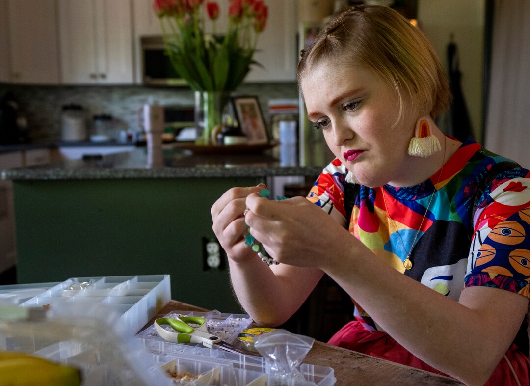 (Rick Egan | The Salt Lake Tribune)  Gracelyn Wilkinson makes "warrior" bracelets to give to others who are dealing with trials, on Tuesday, July 19, 2022.