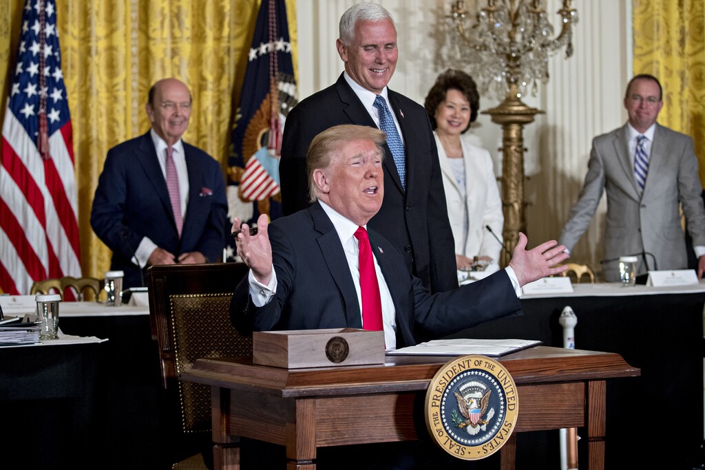 (Andrew Harrer | Bloomberg) President Donald Trump speaks before signing the Space Policy Directive-3 next to U.S. Vice President Mike Pence, during a National Space Council meeting in the East Room of the White House in Washington on Monday, June 18.