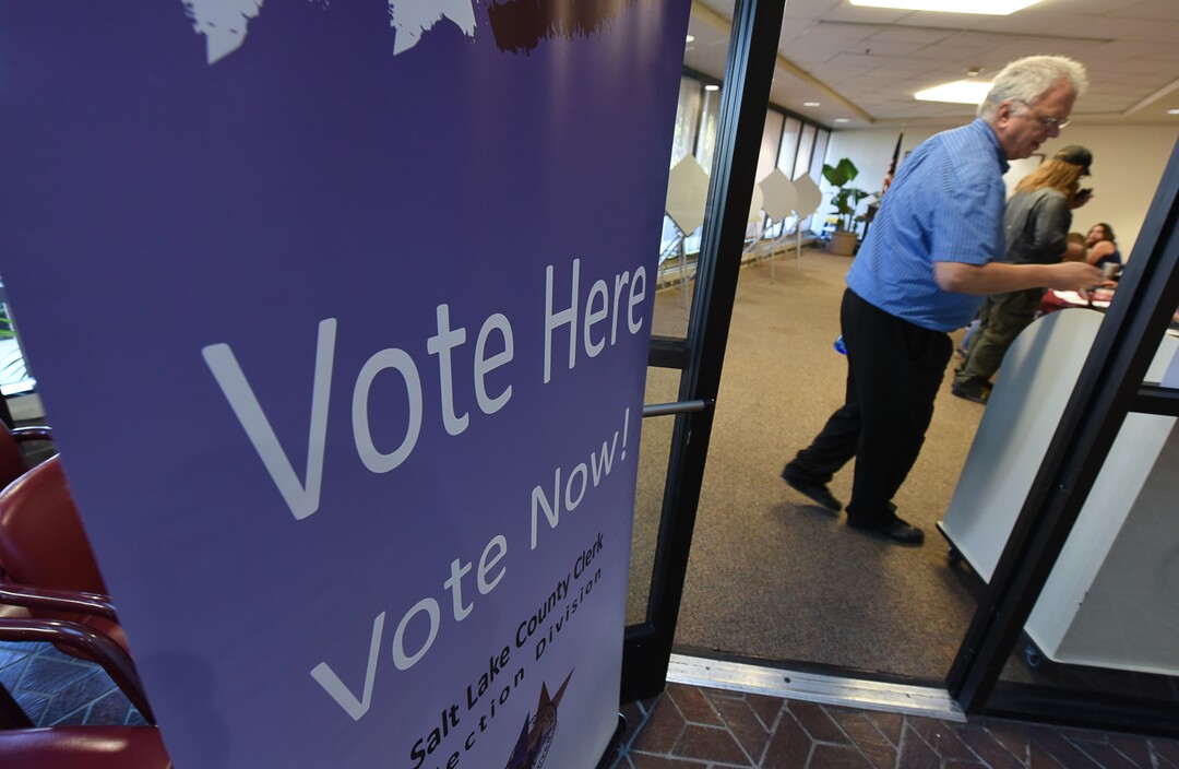 (Francisco Kjolseth  |  The Salt Lake Tribune)  People arrive to vote at the Salt Lake County complex for primary election day on Tuesday, June 26, 2018.