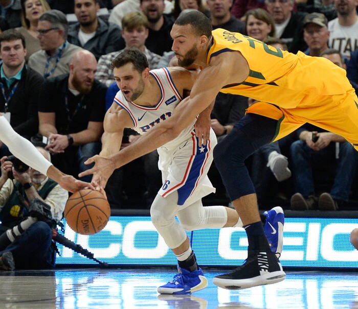 (Francisco Kjolseth  |  The Salt Lake Tribune)  Philadelphia 76ers guard Raul Neto (19) battles Utah Jazz center Rudy Gobert (27) as the Utah Jazz host the Philadelphia 76ers in their NBA basketball game at Vivint Smart Home Arena in Salt Lake City on Wednesday, Nov. 6, 2019.