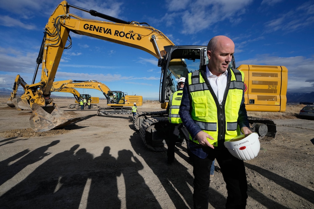 (Francisco Kjolseth  | The Salt Lake Tribune) Gov. Spencer Cox joins other state leaders after breaking ground for phase one of The Point at the site of the former Utah State Prison in Draper on Tuesday, Dec. 17, 2024. 