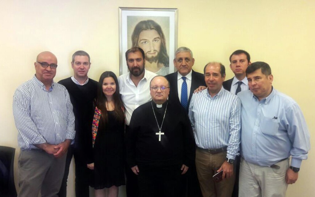 (Francisco Arevalo via AP) This photo released by Francisco Arevalo shows Archbishop Charles Scicluna, center, posing for a photo with members of the religious Marist congregation, after Isaac Givovich, fourth from left, gave his testimony as part of his child sex abuse investigation in Santiago, Chile, Tuesday, Feb. 27, 2018. Scicluna, an envoy sent by Pope Francis, is gathering testimonies regarding Bishop Juan Barros allegedly covering up sexual abuses committed by Vatican-condemned priest Fernando Karadima. Second from left is Spanish Priest Jordi Bartolomeu who is assisting Scicluna. The rest are members of the religious Marista congregation: Jaime Concha, far left, Asuncion Lavin, third from left, Eduardo Arevalo, fourth from right, Jorge Franco, third from right, Juan Pablo Arevalo, second from right, and Gonzalo Dezerega, far right.