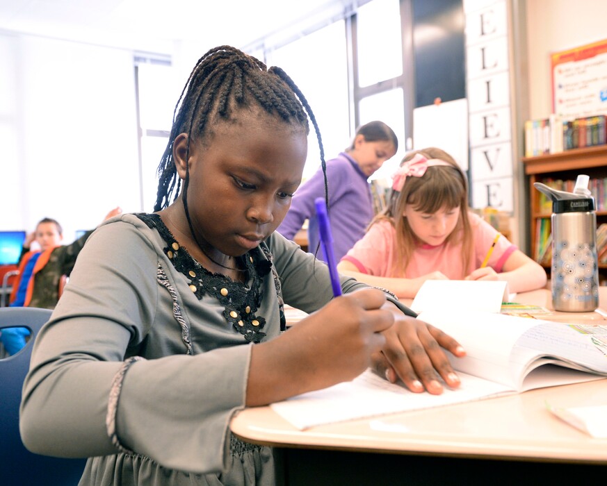 Al Hartmann | The Salt Lake Tribune
Bennion Elementary School fourth grader Kelly Tumusifu works through a spelling excercise. The classroom works in the Advancement Via Individual Determination (AVID) program at the school. The program is designed to get students thinking of completing a degree at a four-year college at an early age.