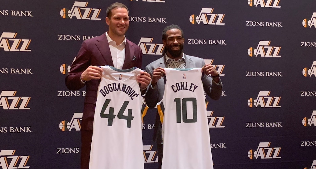 (Eric Walden  |  The Salt Lake Tribune) New Jazz players Bojan Bogdanovic and Mike Conley show off their jerseys after being introduced to the media at the Encore Hotel in Las Vegas on Monday, July 8, 2019.