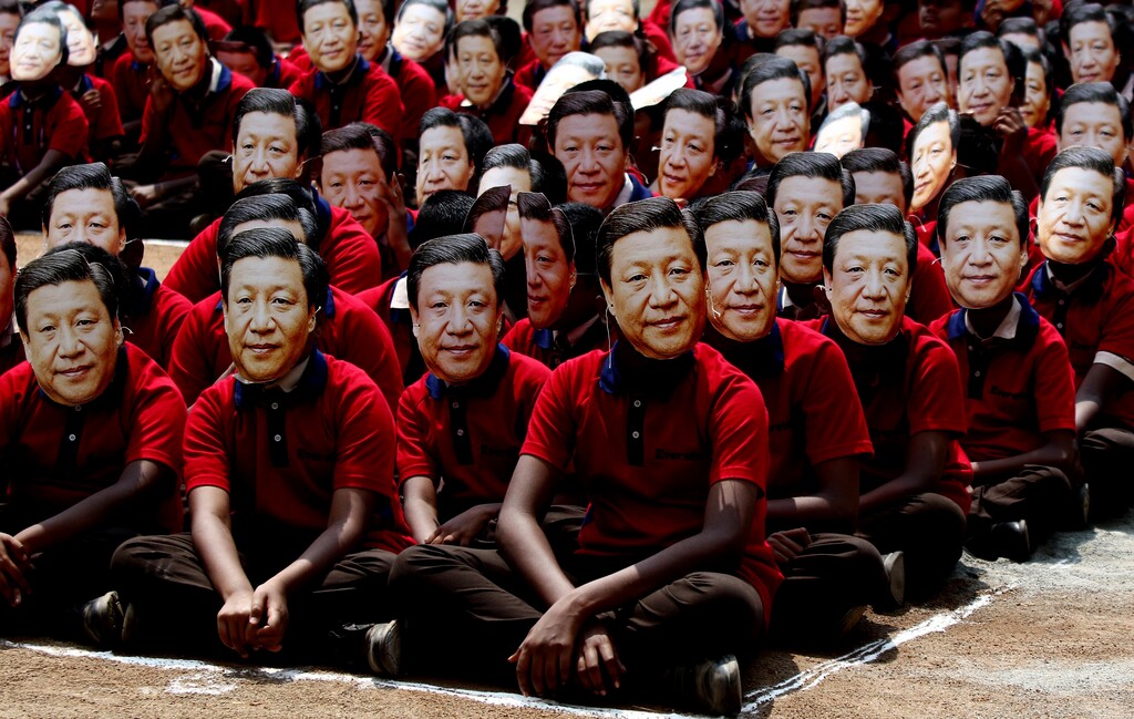 (R. Parthibhan | AP) In this Oct. 10, 2019, photo, Indian school children wear face masks of Chinese President Xi Jinping to welcome him on the eve of his visit in Chennai, India. Chinese President Xi Jinping is coming to India to meet with Prime Minister Narendra Modi on Friday, just weeks after Beijing supported India's rival Pakistan in raising the issue of New Delhi's recent actions in disputed Kashmir at the U.N. General Assembly meeting.