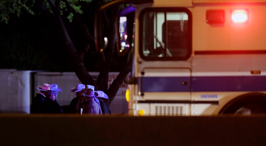 Members of law enforcement stage near the area where a suspect in a series of bombing attacks in Austin blew himself up as authorities closed in, Wednesday, March 21, 2018, in Round Rock, Texas. (AP Photo/Eric Gay)