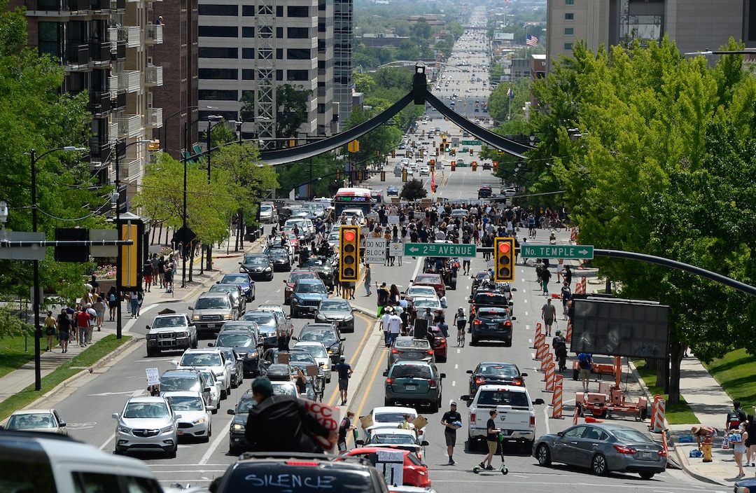 (Francisco Kjolseth  |  The Salt Lake Tribune) Hundreds march in downtown Salt Lake City on Saturday, May 30, 2020.
