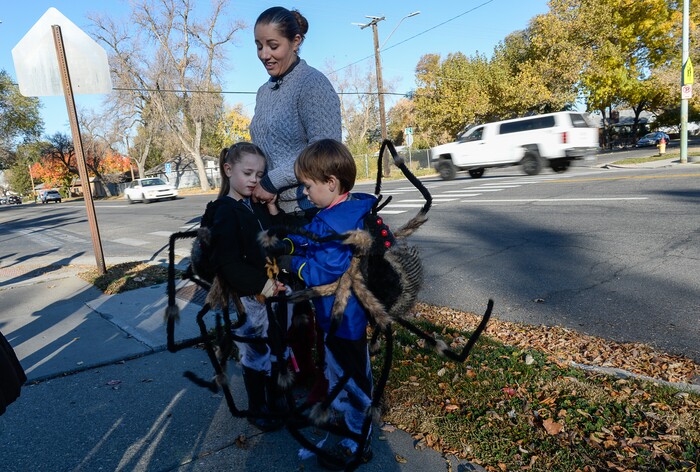 (Francisco Kjolseth  |  The Salt Lake Tribune)  Anna Simmon describes the harrowing Halloween night two years ago when her twin children, Eleanor, left, and Frederick, along with her husband and niece were struck by a truck turning left across traffic at 2100 South and 400 East in Salt Lake. Revisiting the scene she witnessed while following close behind, Simmon relayed her story in hopes of keeping trick-or-treaters of all ages safe this year. 