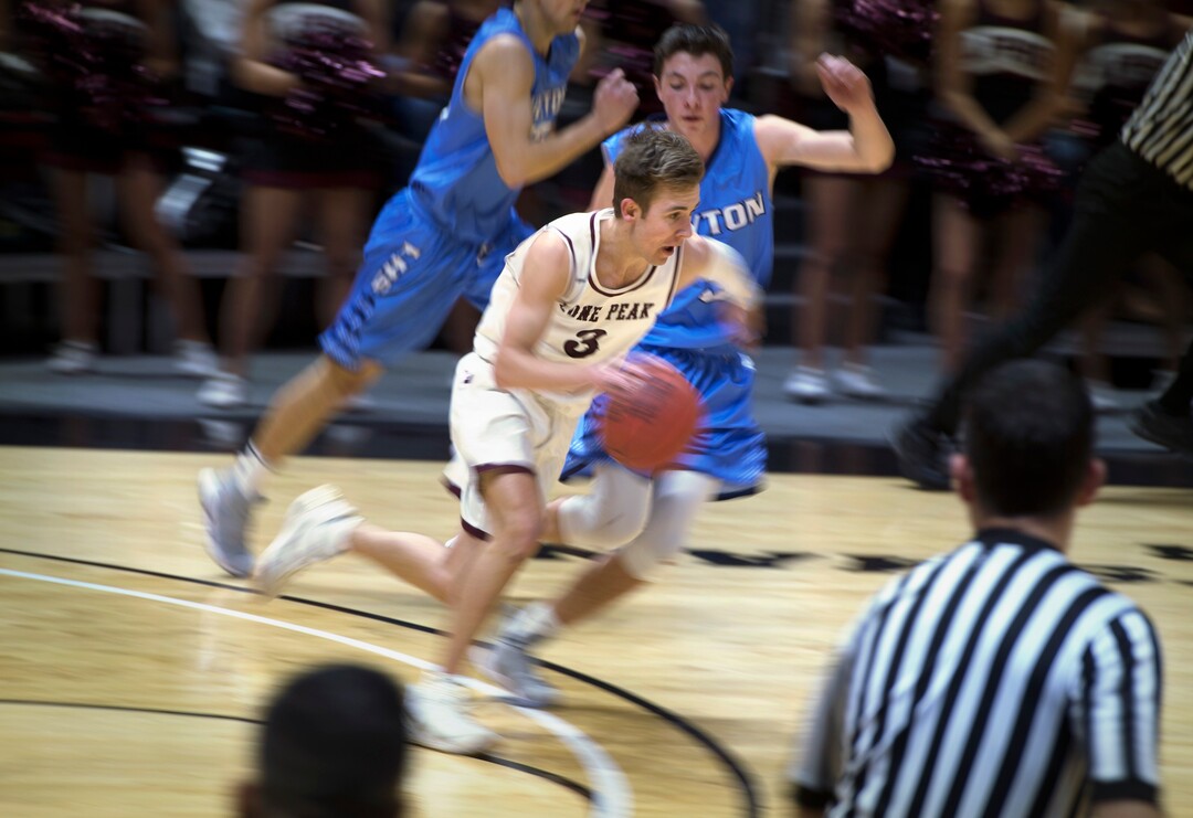 Scott Sommerdorf | The Salt Lake TribuneLone Peaks' Steven Ashworth brings up the ball during first half play. Lone Peak beat Layton 82-47, in a boy's 6A semi-final, FrIday, March. 2, 2018.