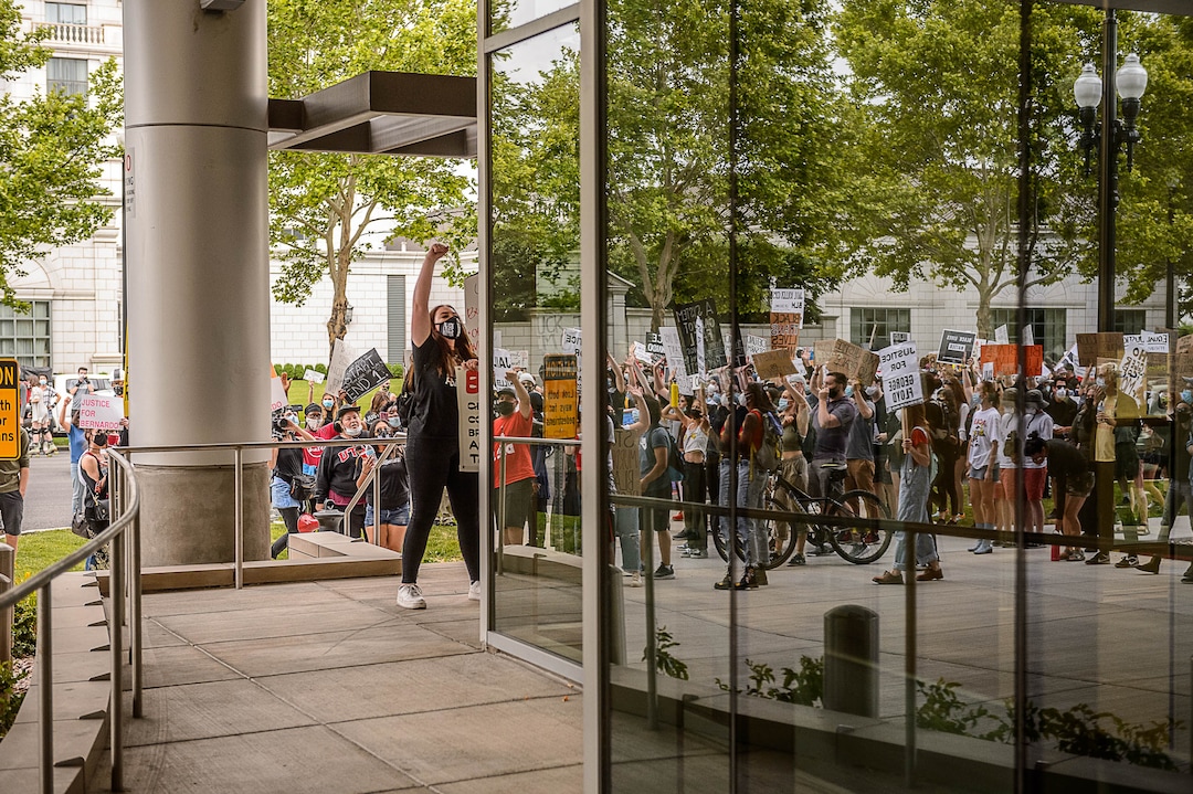 (Trent Nelson  |  The Salt Lake Tribune) People gather at the Salt Lake County District Attorney's office to protest against police brutality in Salt Lake City on Saturday, June 13, 2020.