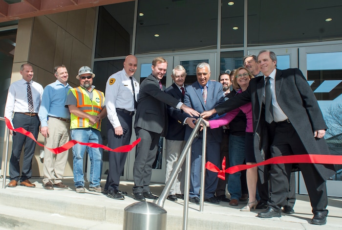 (Rick Egan  |  The Salt Lake Tribune)    County officials cut the ribbon along with Sim Gill, Salt Lake County District Attorney, at the new Salt Lake County District Attorney building in Salt Lake City, Friday, March 9, 2018.


