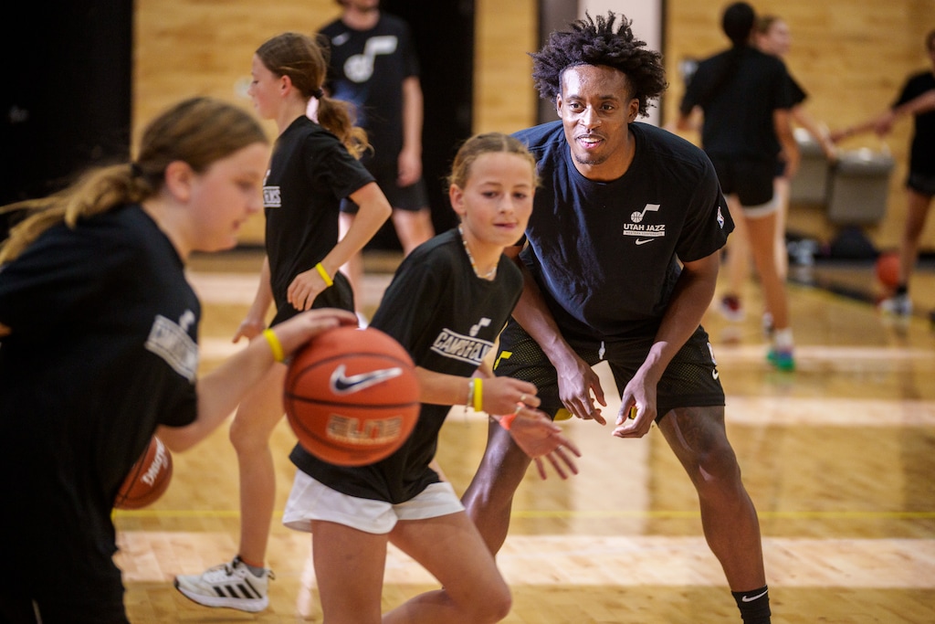 (Trent Nelson  |  The Salt Lake Tribune) Utah Jazz guard Collin Sexton runs a basketball workshop for girls in Lehi on Thursday, Oct. 13, 2022.