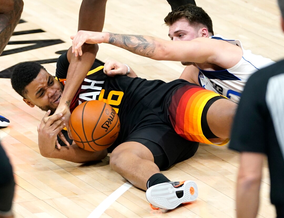 (Rick Egan | The Salt Lake Tribune)  Utah Jazz forward Juwan Morgan (16) goes for a loose ball along with Dallas Mavericks guard Luka Doncic (77), in NBA action between the Utah Jazz and the Dallas Mavericks at Vivint Arena, on Friday, Jan. 29, 2021.