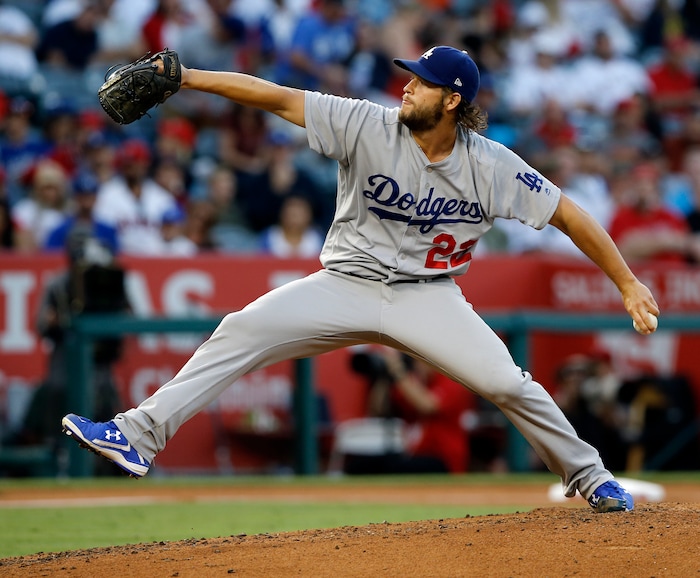 Los Angeles Dodgers starting pitcher Clayton Kershaw winds up during the third inning of the team's baseball game against the Los Angeles Angels in Anaheim, Calif., Thursday, June 29, 2017. (AP Photo/Alex Gallardo)