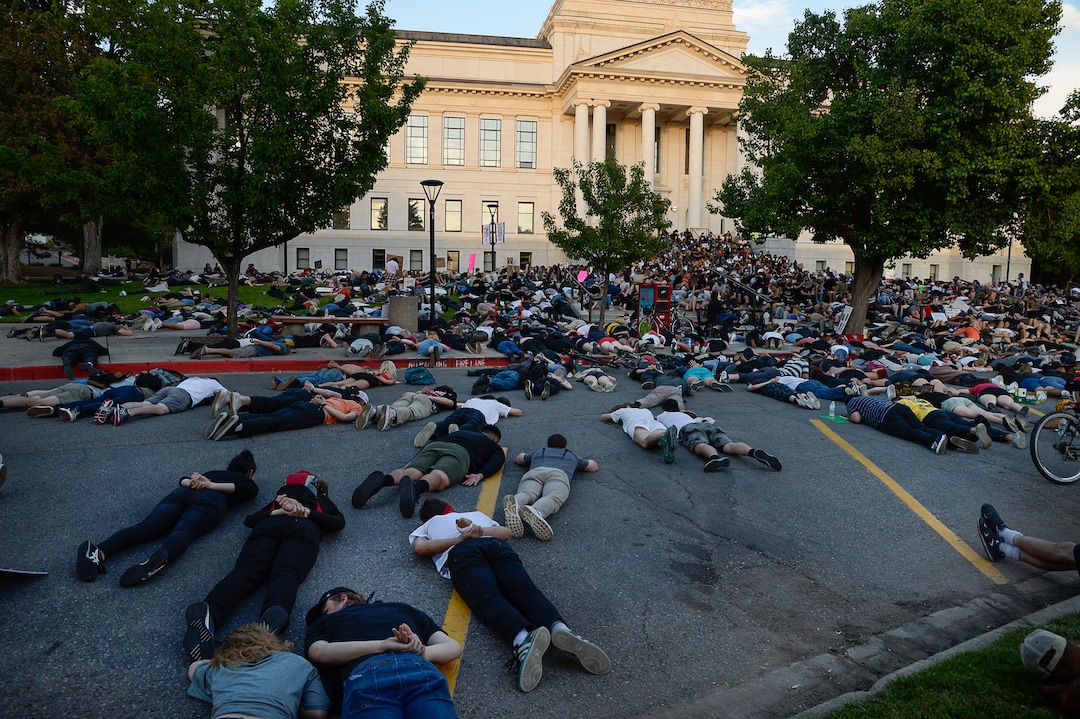 (Francisco Kjolseth  |  The Salt Lake Tribune) Demonstrators protesting against police brutality lay down in silence in honor of George Floyd on President's Circle at the University of Utah on Wednesday, June 3, 2020, in Salt Lake City, as the initially set 8 p.m. weeklong curfew was removed.