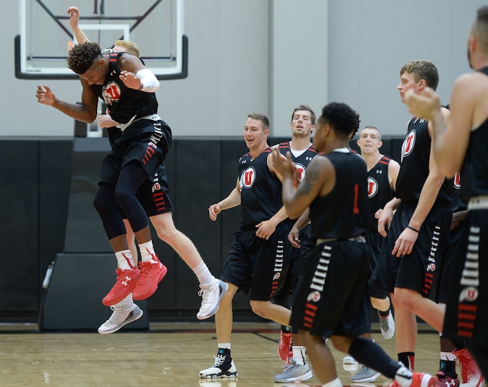 (Francisco Kjolseth  |  The Salt Lake Tribune)  Chris Seeley and Jake Connor celebrate as the Utah men's basketball program begins fall practices with a fairly new roster of players on Friday, Sept. 29, 2017.