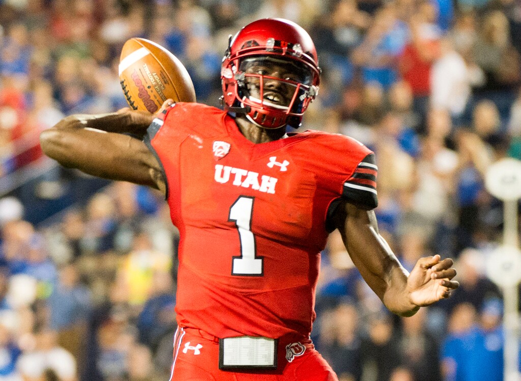(Rick Egan  |  The Salt Lake Tribune)   Utah Utes quarterback Tyler Huntley (1) looks for  an open man in the end zone, in football action BYU vs Utah, at Lavell Edwards Stadium in Provo, Saturday, September 9, 2017.