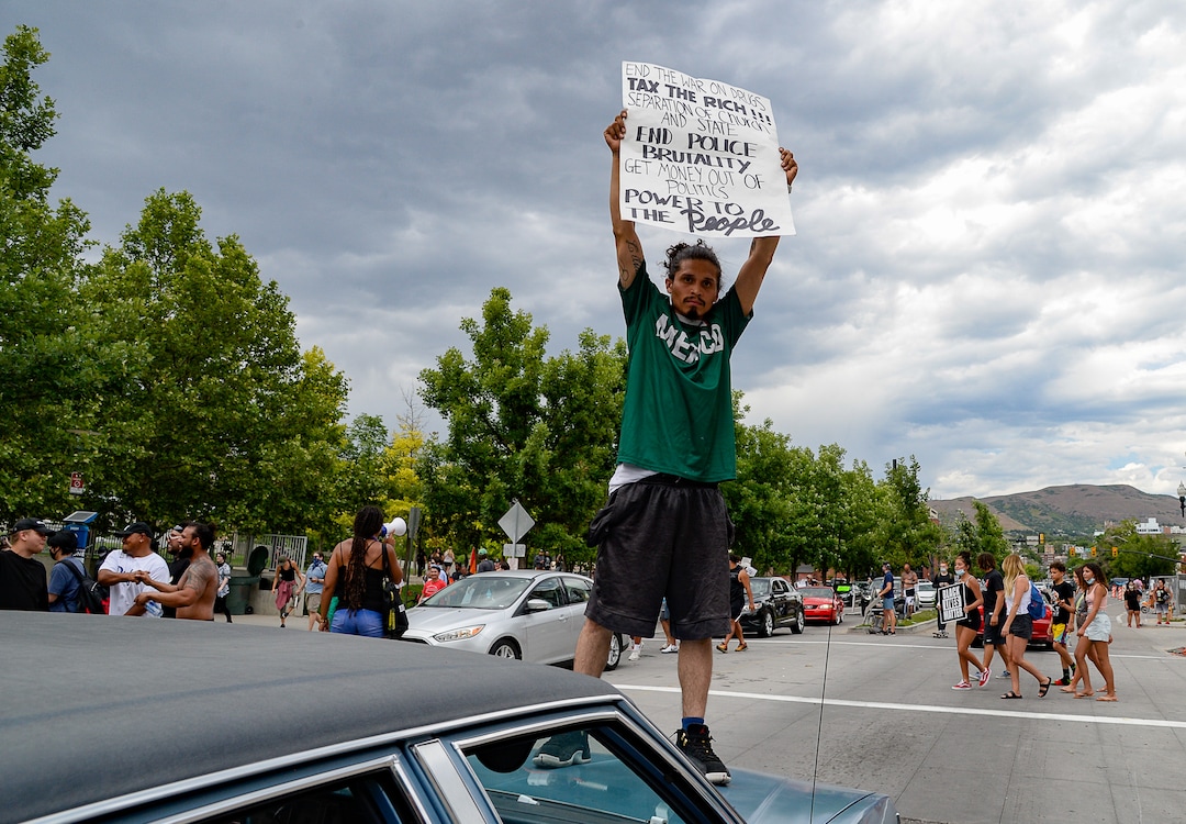 (Francisco Kjolseth  |  The Salt Lake Tribune) Hundreds march in downtown Salt Lake City on Saturday, May 30, 2020.