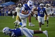 (George Frey | Special to The Tribune) BYU Cougars quarterback Bear Bachmeier (47) jumps over his teammate to go in for a touchdown during a game against Notre Dame Fighting Irish at LaVell Edwards Stadium on October 17, 2026.