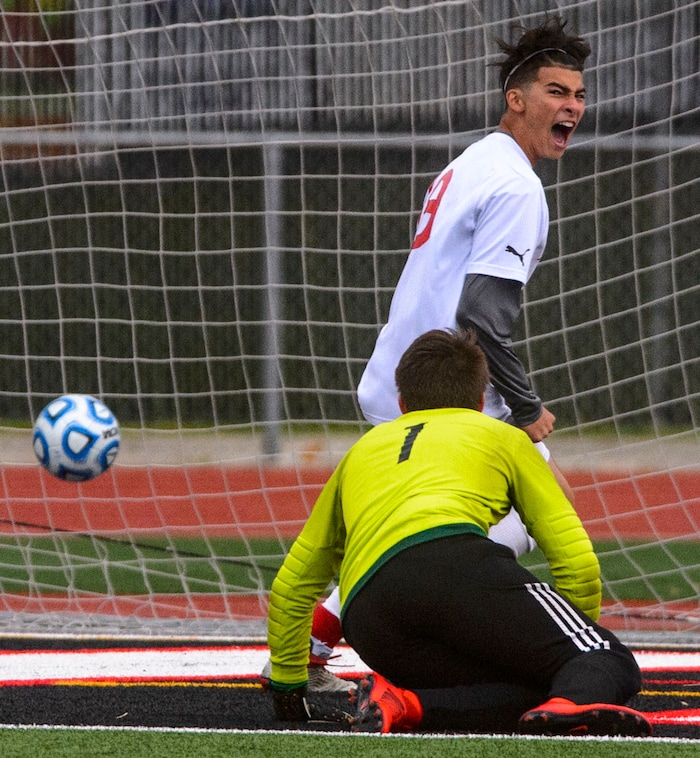 (Steve Griffin  |  The Salt Lake Tribune) Judge's Dominic Arias screams his excitement after beating Delta goal keeper Tristun Anderson for a goal during the Class 3A boys' soccer state semifinal at Alta High School in Sandy Friday May 11, 2018.