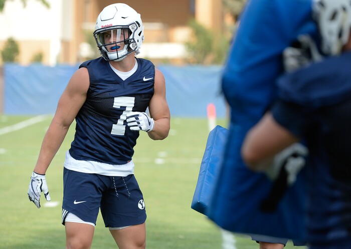 (Francisco Kjolseth  |  The Salt Lake Tribune)  BYU's Beau Hoge runs through drills as the team opens preseason training camp on their practice field on Thursday, Aug. 2, 2018.