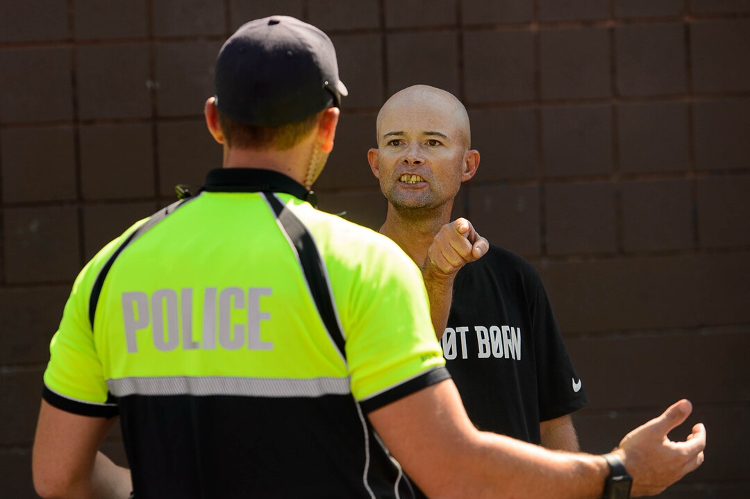 (Trent Nelson | The Salt Lake Tribune)  A man argues with police as workers install barriers on Rio Grande in Salt Lake City to prevent auto traffic in hopes of stopping the drug traffic around the area, Friday September 1, 2017.