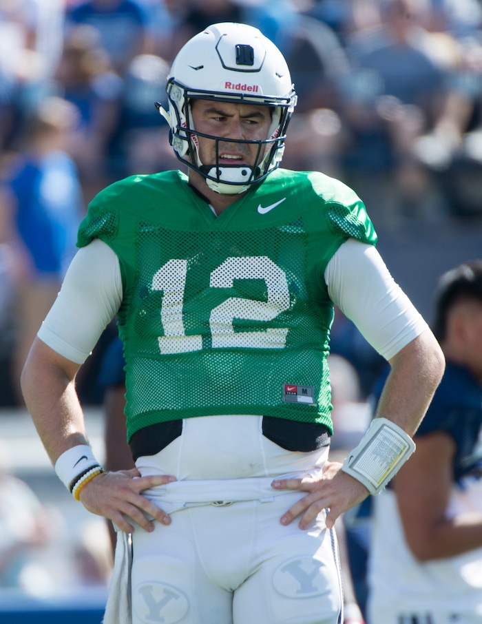 (Rick Egan  |  The Salt Lake Tribune) BYU quarterback, Tanner Mangum (12) runs the offense, during the BYU Cougars public scrimmage at Lavell Edwards Stadium, Thursday, August 17, 2017.