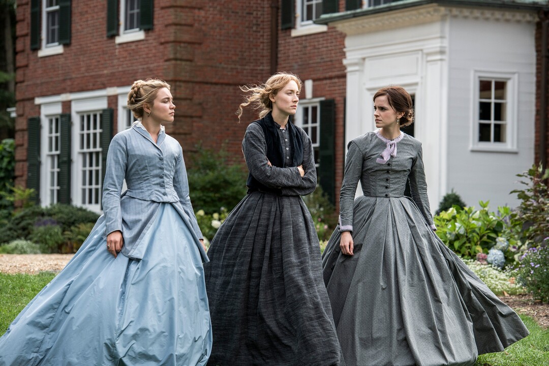 This image released by Sony Pictures shows, from left, Florence Pugh, Saoirse Ronan and Emma Watson in a scene from "Little Women." (Wilson Webb/Sony Pictures via AP)
