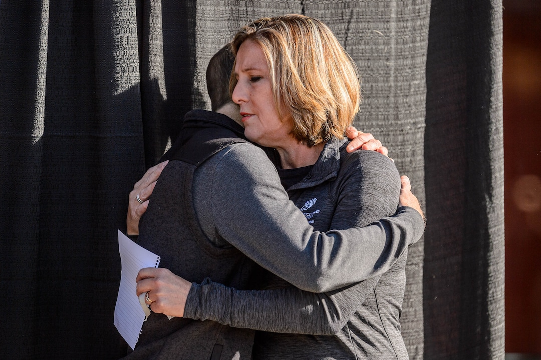 (Trent Nelson  |  The Salt Lake Tribune) Matt and Jill McCluskey, parents of Lauren McCluskey, embrace during a news conference announcing a settlement of their lawsuit against the University of Utah, in Salt Lake City on Thursday, Oct. 22, 2020.