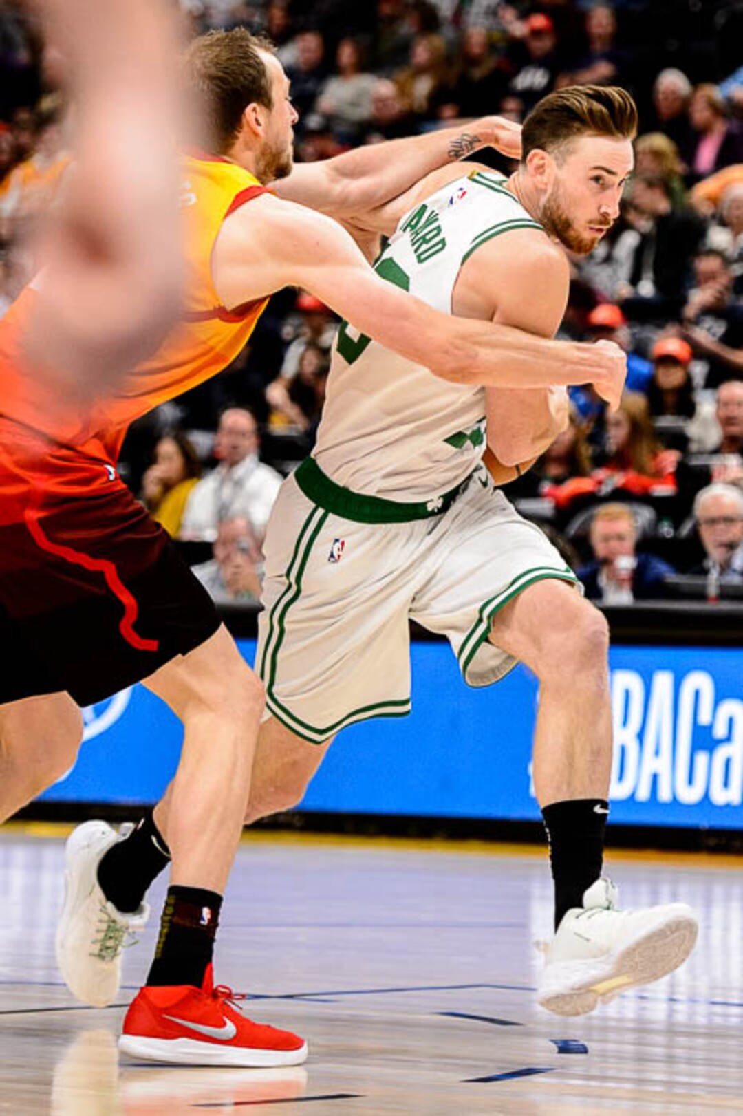 (Trent Nelson | The Salt Lake Tribune)  Boston Celtics forward Gordon Hayward (20) is fouled by Utah Jazz forward Joe Ingles (2). Utah Jazz vs. Boston Celtics, NBA basketball in Salt Lake City on Friday Nov. 9, 2018.