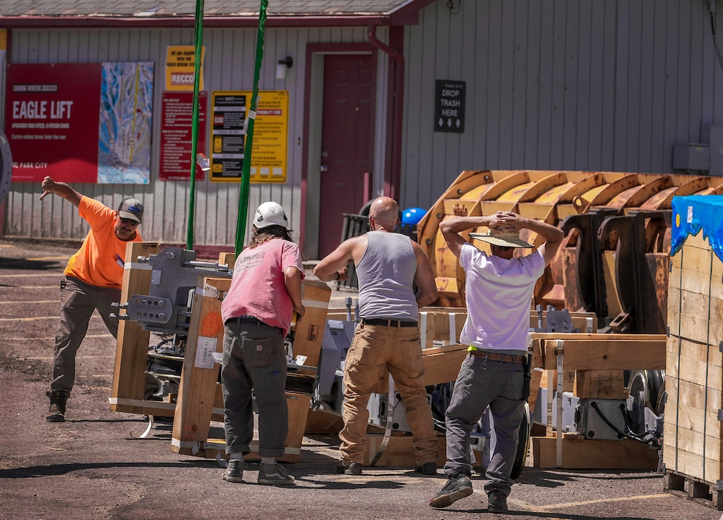 (Leah Hogsten | The Salt Lake Tribune) Park City Mountain Resort employees move parts designated for the resort's new Eagle lift, Thursday, July 7, 2022. Residents last month blocked the resort from being able to install the lift because of discrepancies in resort capacities by two firms.