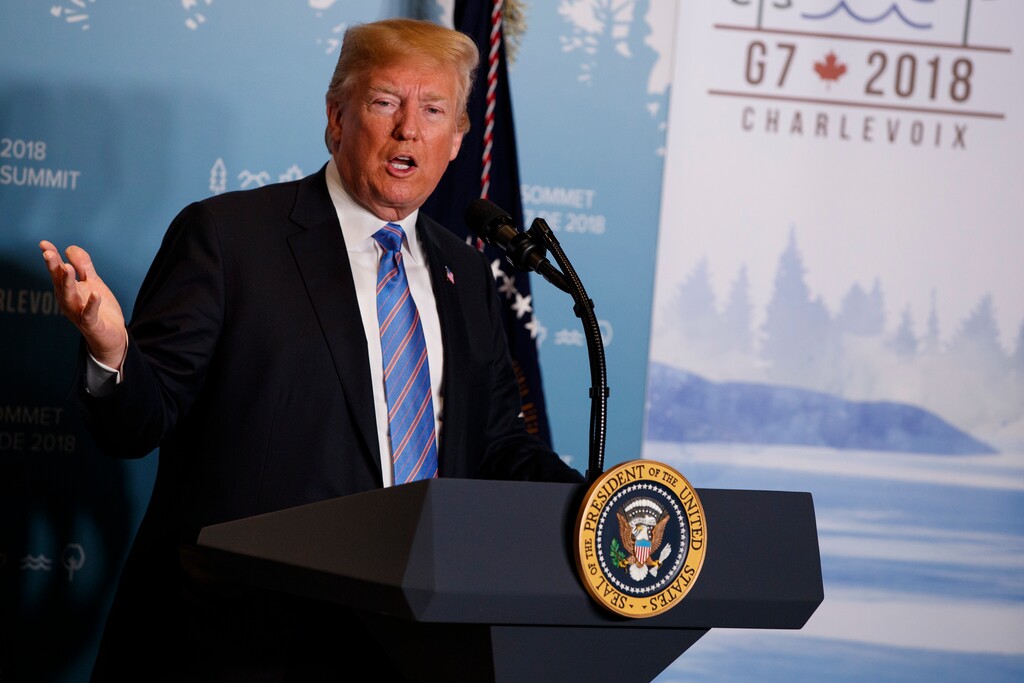 FILE - In this June 9, 2018 file photo, President Donald Trump speaks during a news conference at the G-7 summit in La Malbaie, Quebec, Canada.  New York Attorney General sues the Trump Foundation, Thursday, June 14, saying it engaged in a pattern of illegal self-dealing. (AP Photo/Evan Vucci, File)