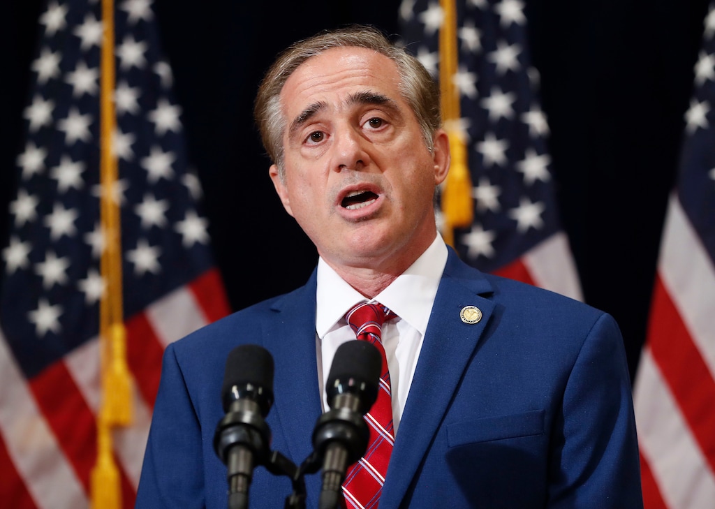 In this Aug. 16, 2017 photo, Veterans Affairs Secretary David Shulkin speaks during a press briefing in Bridgewater, N.J. The Department of Veterans Affairs has abruptly dropped plans to suspend an ethics law barring employees from receiving benefits from for-profit colleges. The move comes after criticism from government watchdogs, who warned of financial entanglements between government and the private companies vying for millions in GI Bill tuition. In a statement to The Associated Press, the VA said it had received "constructive comments" and as a result would delay action.   (AP Photo/Pablo Martinez Monsivais)