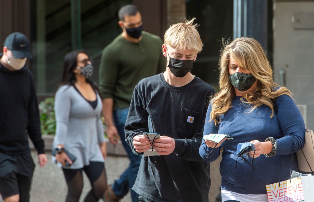 (Rick Egan | The Salt Lake Tribune). Shoppers wear masks as they shop in downtown Salt Lake City on Friday, Nov. 6, 2020.