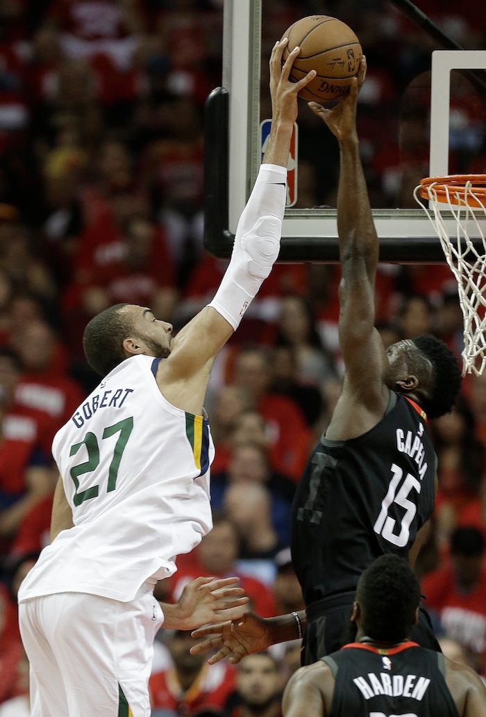 Houston Rockets center Clint Capela (15) blocks the shot of Utah Jazz center Rudy Gobert during the first half in Game 2 of an NBA basketball second-round playoff series, Wednesday, May 2, 2018, in Houston. (AP Photo/Eric Christian Smith)